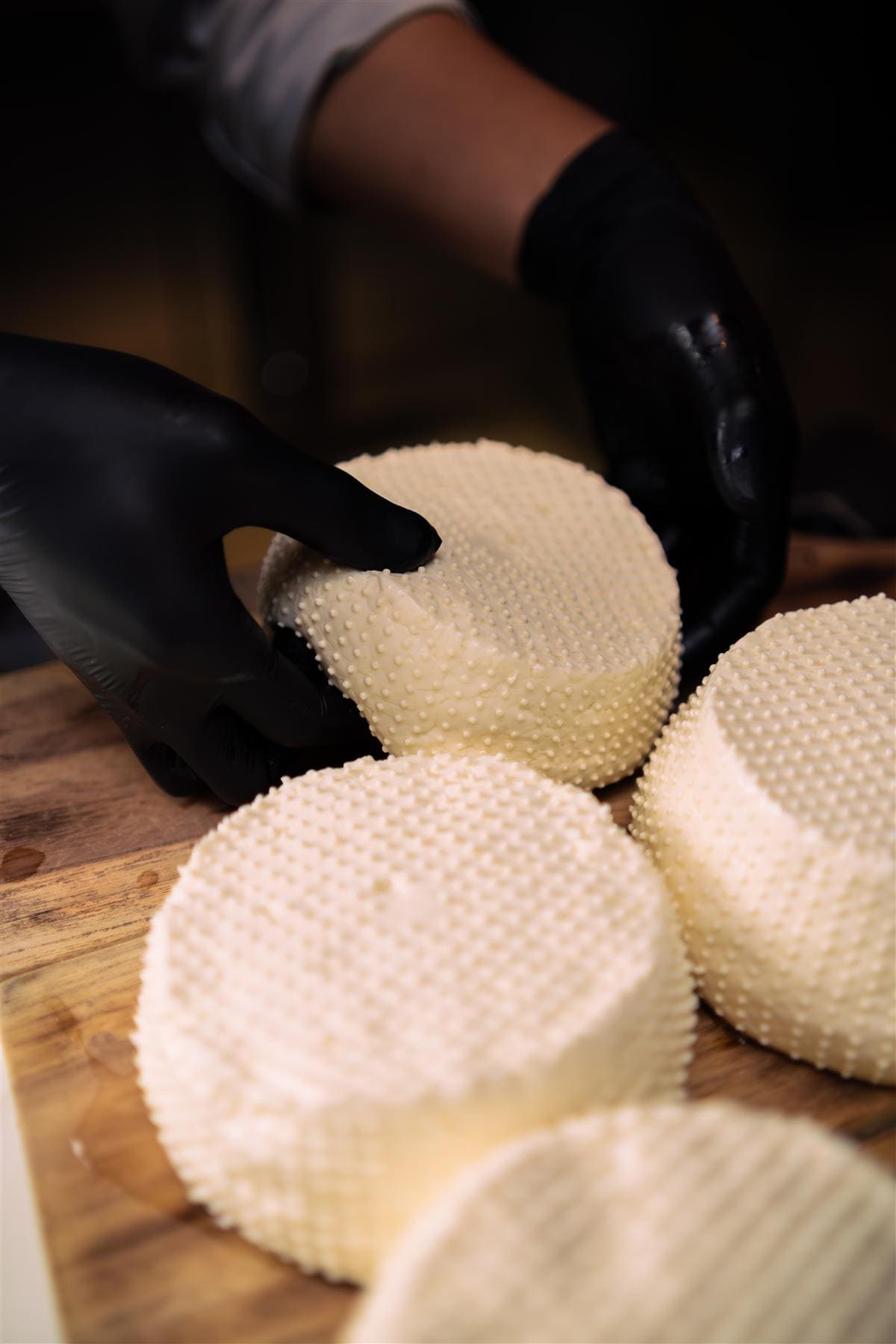 Artisanal cheese being crafted at Brie Cheesery