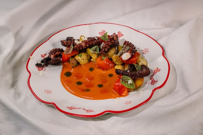 Octopus with Potatoes, Romesco Sauce & Ham Chips — Brie Restaurant & Cheesery, Ubud
