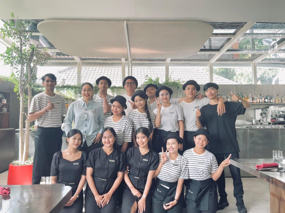 Brie restaurant team member serving guests in Ubud